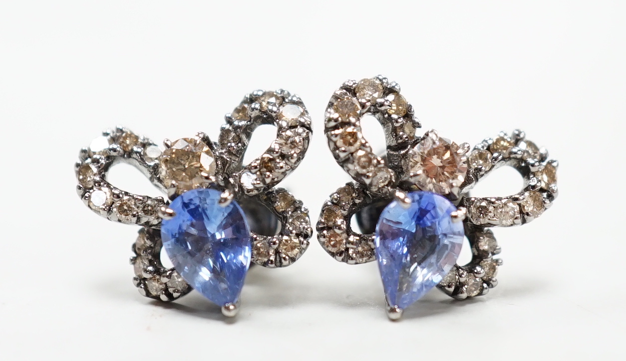 A pair of 750 white metal, sapphire and diamond cluster set bug earrings, width 13mm, gross weight 3.8 grams.